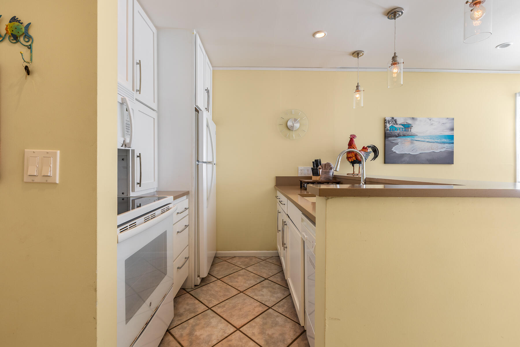 620 Thomas Street, Unit 175 Key West, FL 33040 - Photo 10 of 30 a bathroom with a sink a mirror and a shower