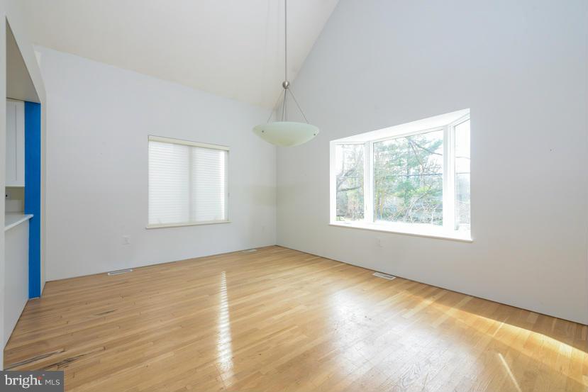 6613 Persimmon Tree Road Cabin John, MD 20818 - Photo 13 of 23 a view of an empty room with a window