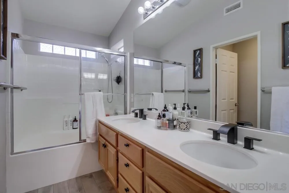 1966 Verbena Terrace Alpine, CA 91901 - Photo 24 of 41 a bathroom with a double vanity sink mirror and double