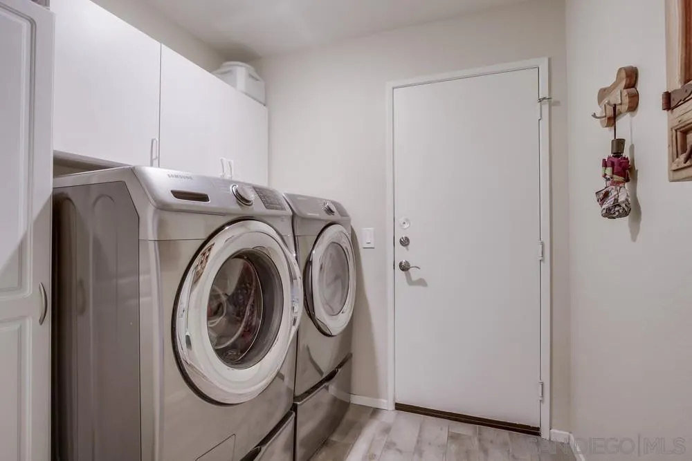 1966 Verbena Terrace Alpine, CA 91901 - Photo 33 of 41 a utility room with dryer and washer