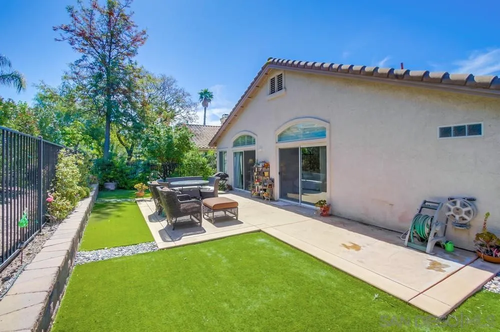 1966 Verbena Terrace Alpine, CA 91901 - Photo 35 of 41 a view of a house with backyard porch and sitting area