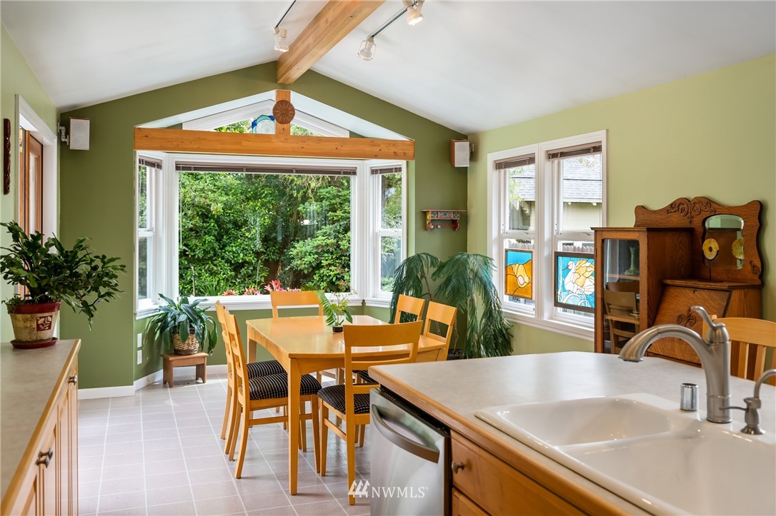 2315 North 57th Street Seattle, WA 98103 - Photo 13 of 35 a view of a dining room with furniture window and outside view