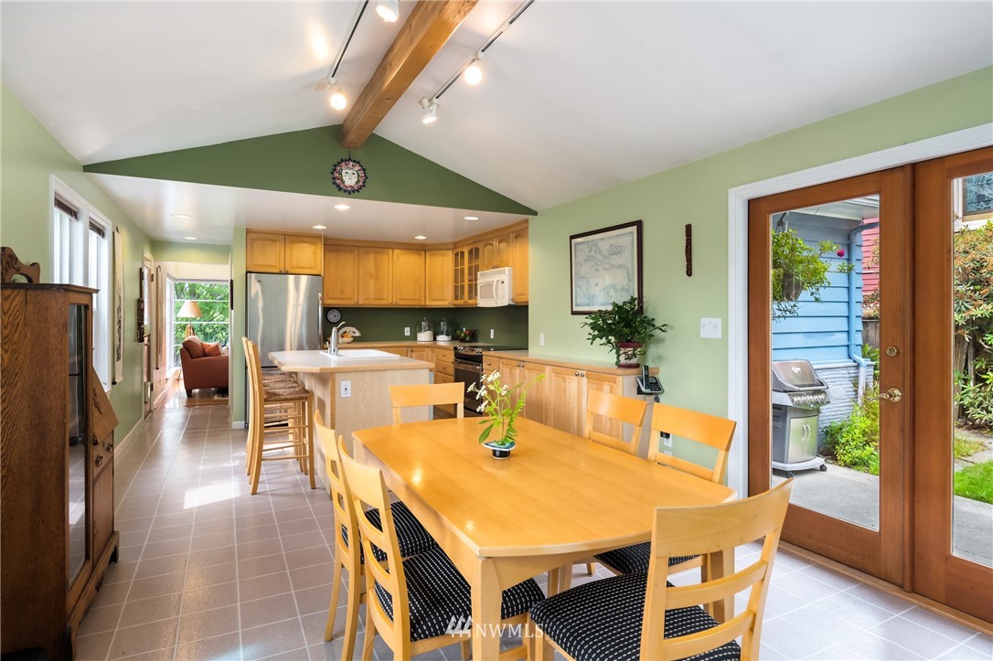 2315 North 57th Street Seattle, WA 98103 - Photo 14 of 35 a view of a dining room with furniture window and outside view