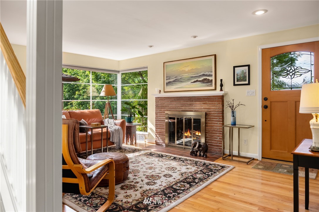 2315 North 57th Street Seattle, WA 98103 - Photo 19 of 35 a living room with furniture and a fireplace