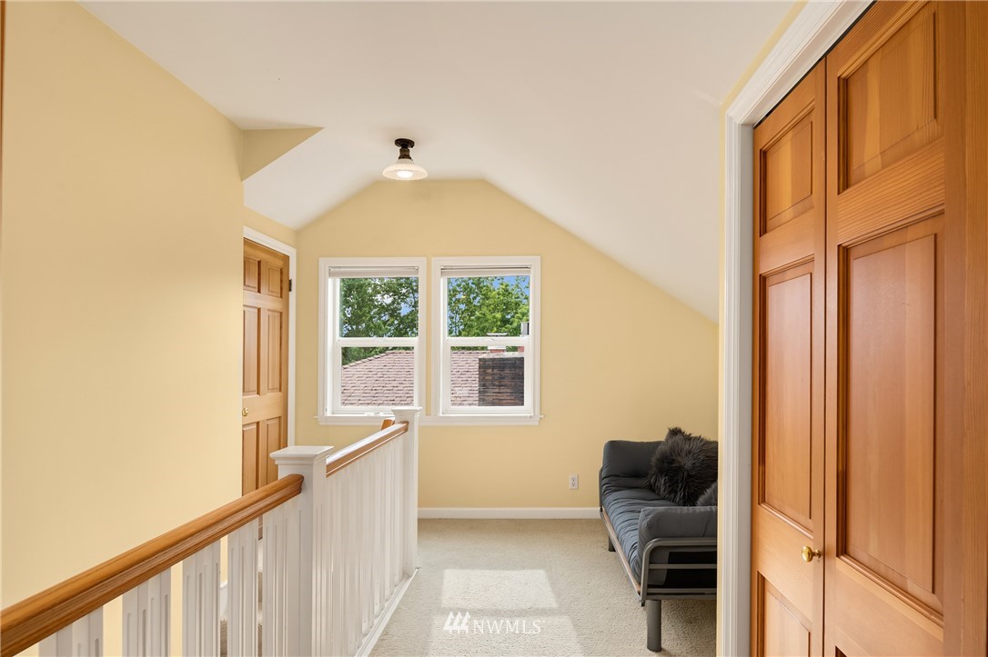 2315 North 57th Street Seattle, WA 98103 - Photo 25 of 35 a view of entryway and hall with wooden floor