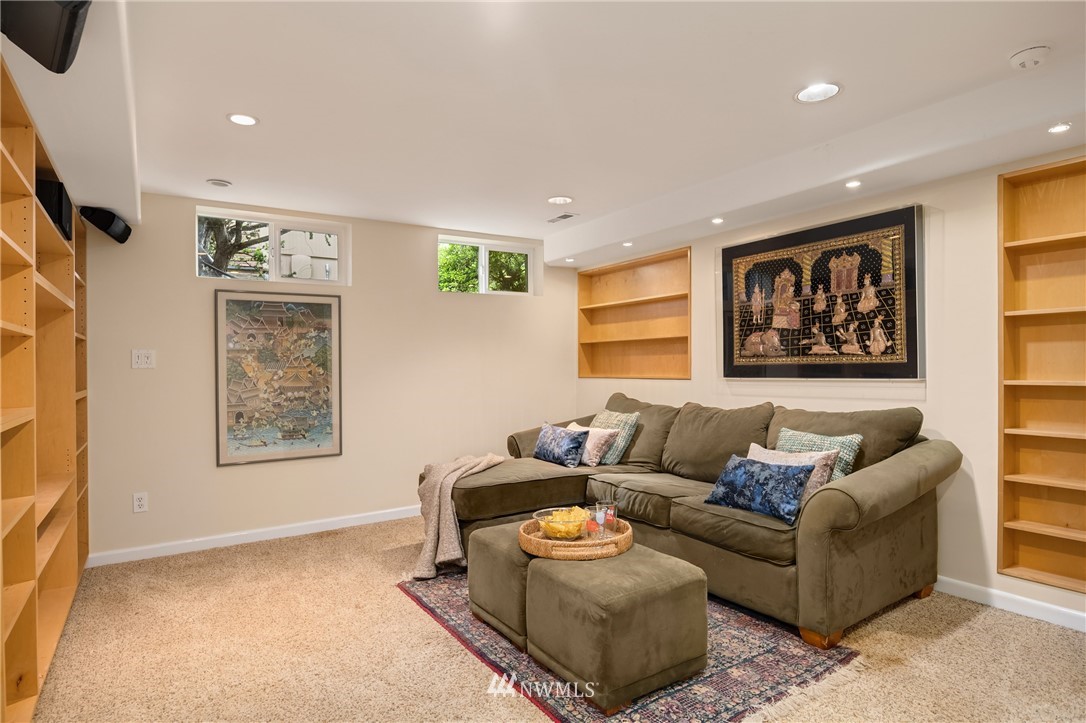2315 North 57th Street Seattle, WA 98103 - Photo 30 of 35 a living room with furniture and a window