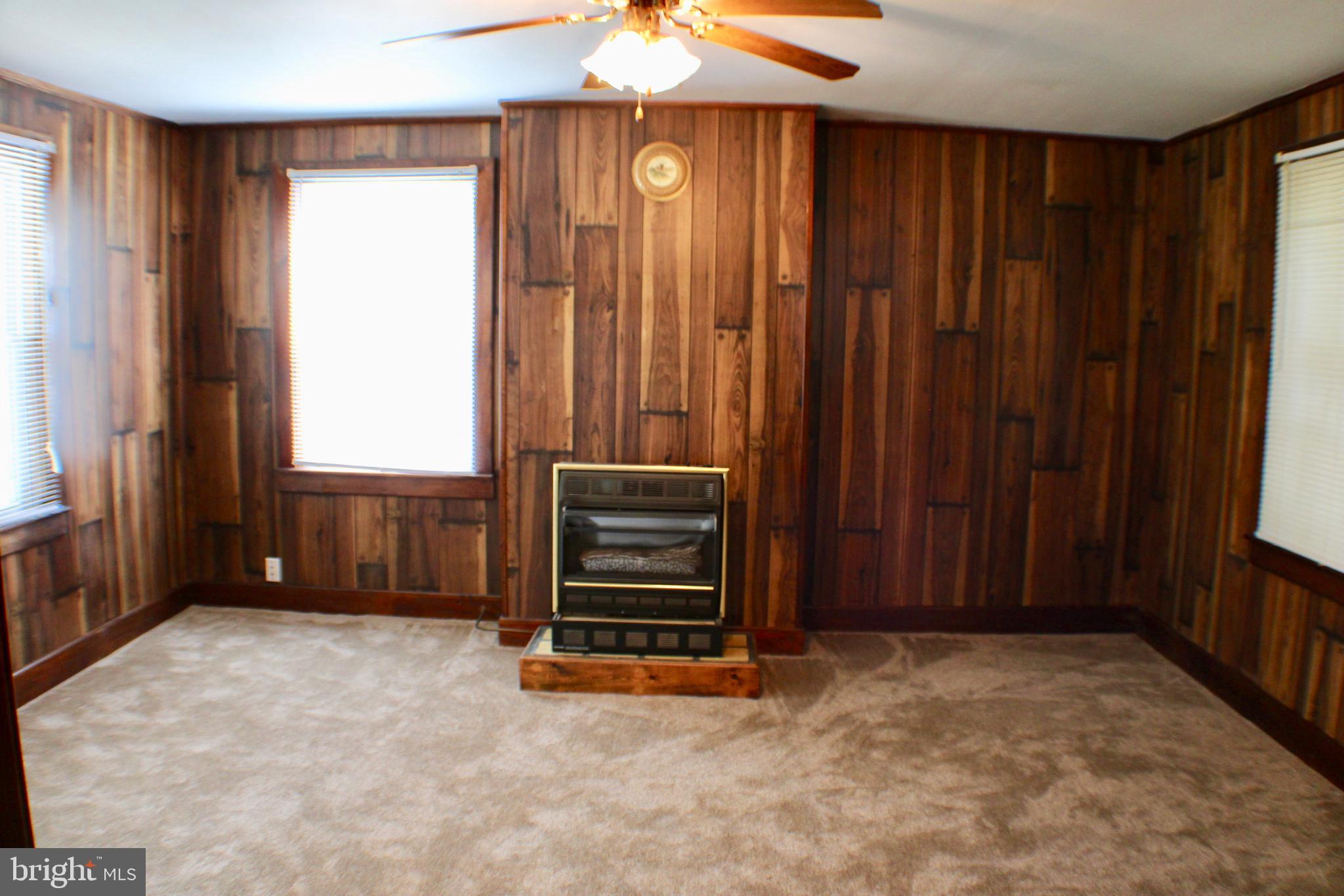 105 Rice Street Berryville, VA 22611 - Photo 8 of 24 Living room with gas log fireplace