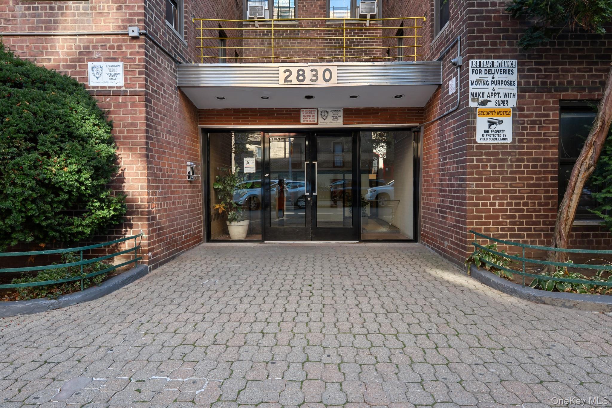 2830 Briggs Avenue, Unit 4F Bronx, NY 10458 - Photo 14 of 16 Property entrance featuring brick siding and french doors