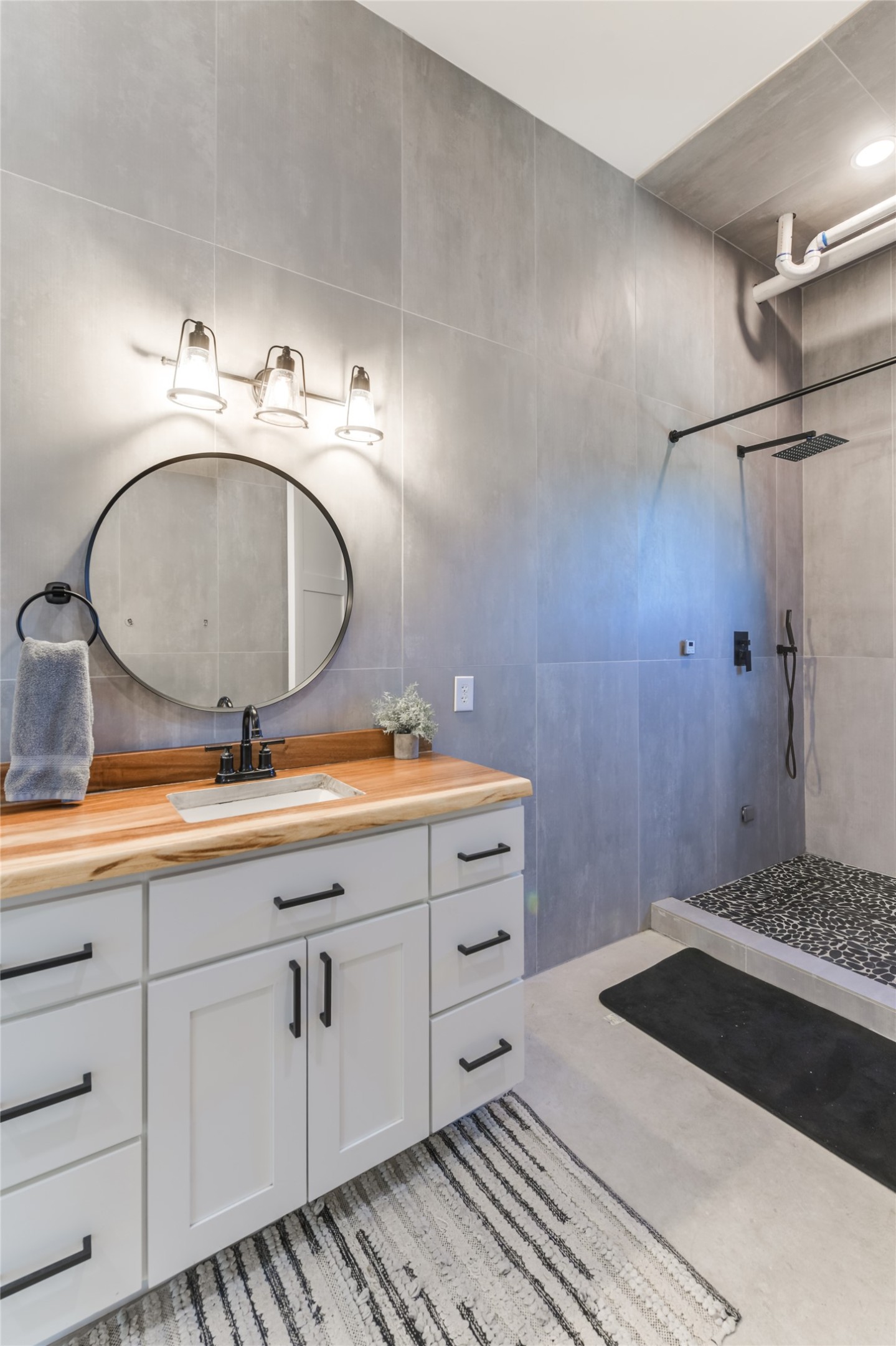 0 Trails End Road Leander, TX 78641 - Photo 16 of 40 a bathroom with a sink and a mirror