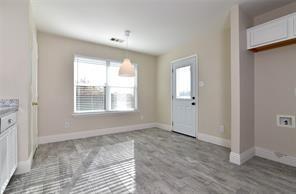321 South Chestnut Street Forney, TX 75126 - Photo 15 of 27 a view of an empty room with wooden floor and a window