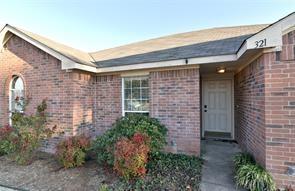 321 South Chestnut Street Forney, TX 75126 - Photo 2 of 27 a front view of a house with a yard