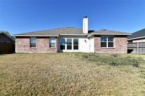 321 South Chestnut Street Forney, TX 75126 - Photo 26 of 27 a front view of a house with garden