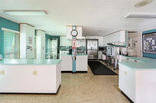 a living room with lots of furniture and a flat screen tv