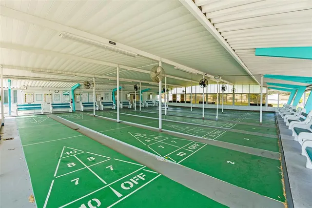 a view of a lake with a house in the background
