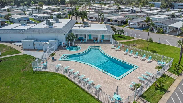 an aerial view of a garden with houses