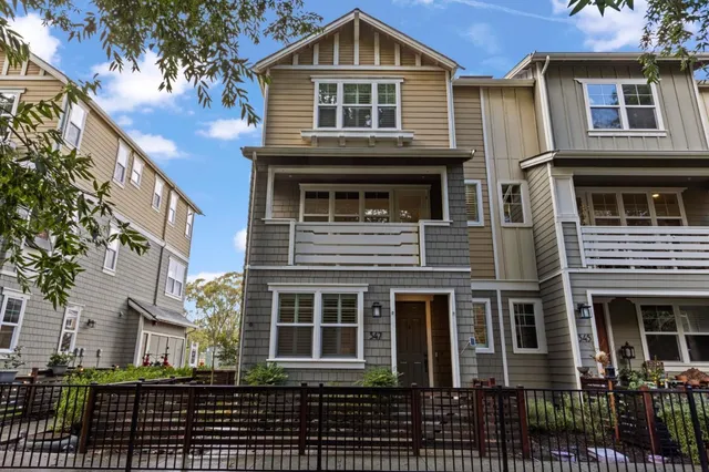 a front view of a house with glass windows