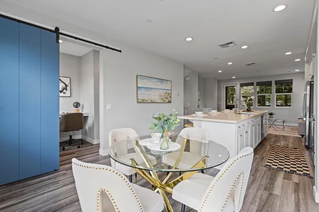 a living room with furniture and a table