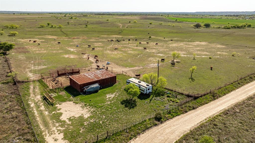 90 County Road 515 Gustine, TX 76452 - Photo 3 of 23 a view of a city with an ocean