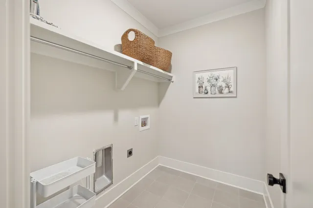 a spacious bathroom with a double vanity sink a mirror and a bathtub