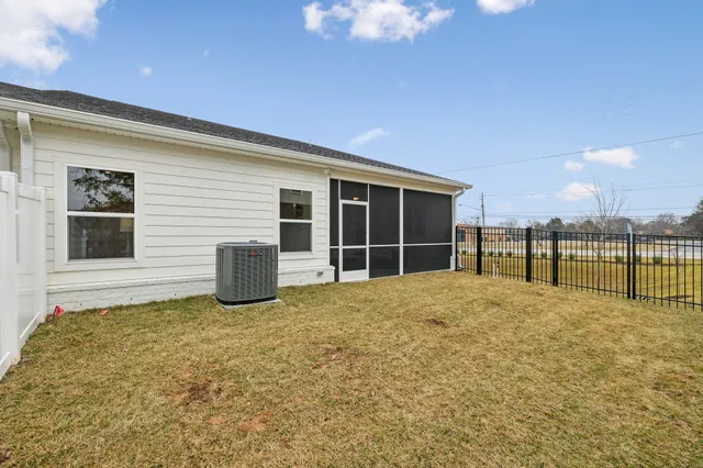a view of a park with sitting area