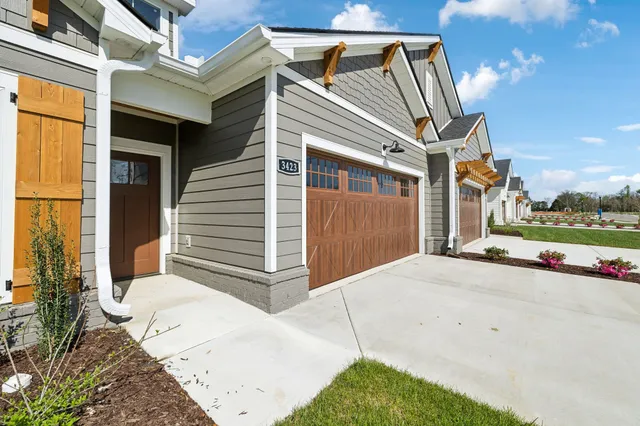 a view of a hallway with white walls