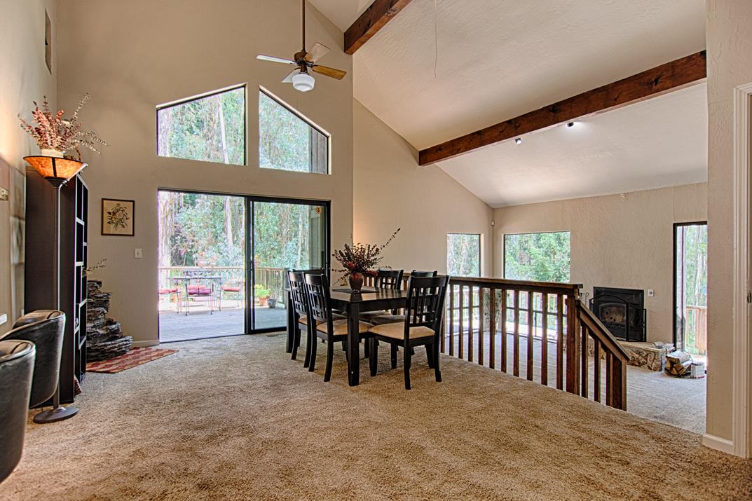 217 Gillette Road Watsonville, CA 95076 - Photo 1 of 16 a view of a livingroom with furniture and floor to ceiling window