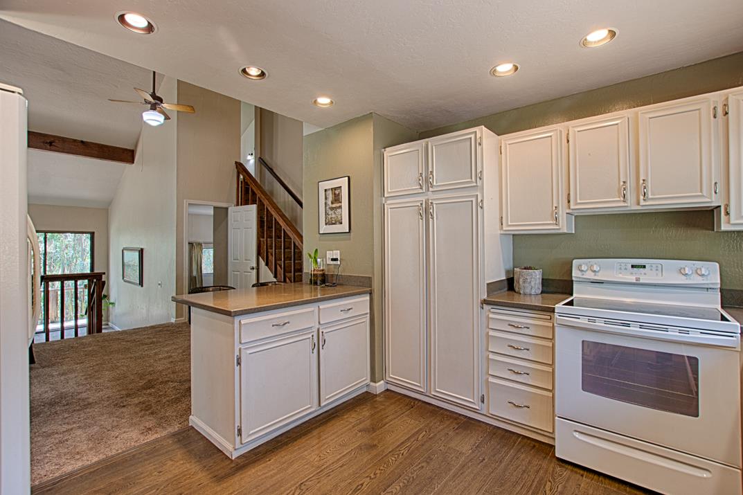 217 Gillette Road Watsonville, CA 95076 - Photo 8 of 16 a kitchen with a stove top oven and refrigerator