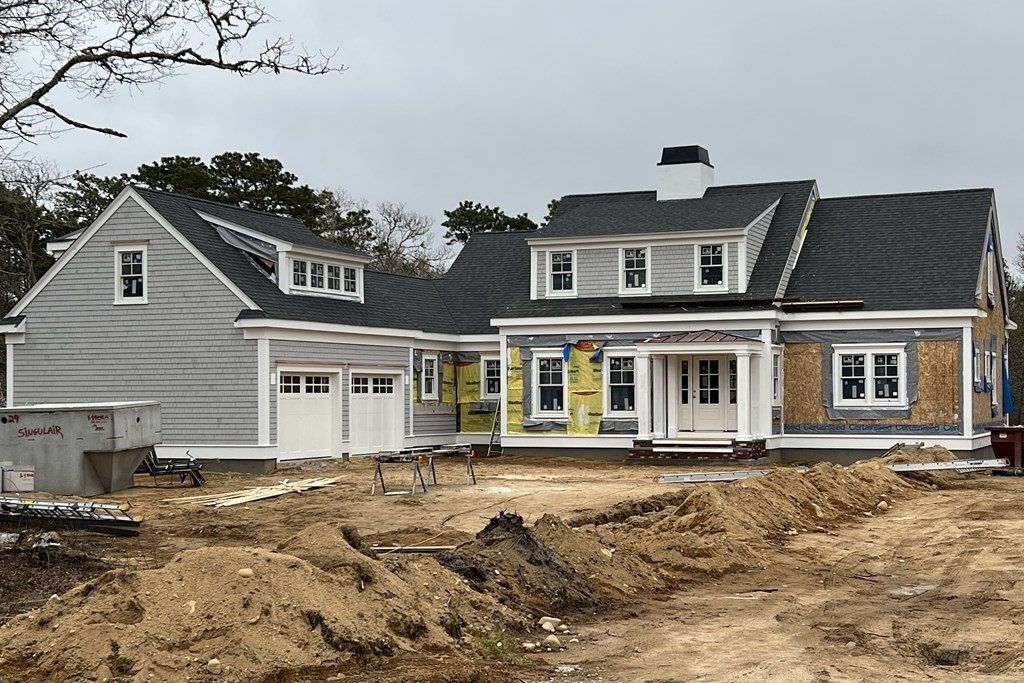 8 Lot 10 - 8 Bascom Hollow Harwich, MA 02645 - Photo 1 of 7 a front view of a house with a yard