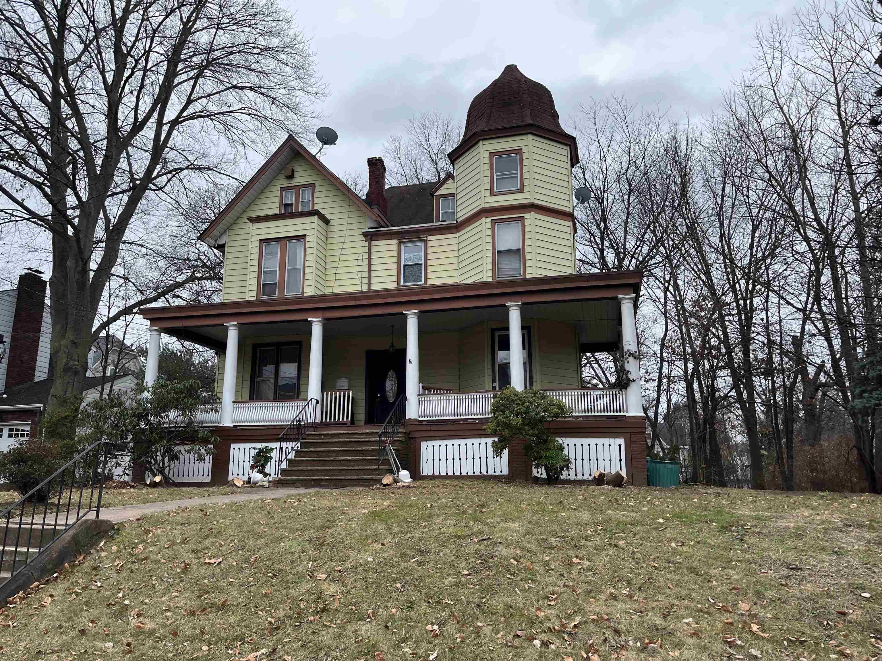 a front view of a house with garage