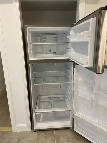 a living room with a couch and a flat screen tv