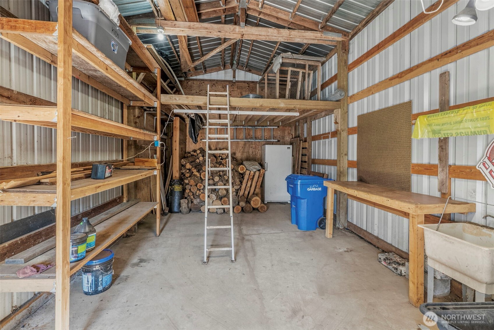 202 Waters Road Castle Rock, WA 98611 - Photo 10 of 38 a view of an empty room with lots of storage