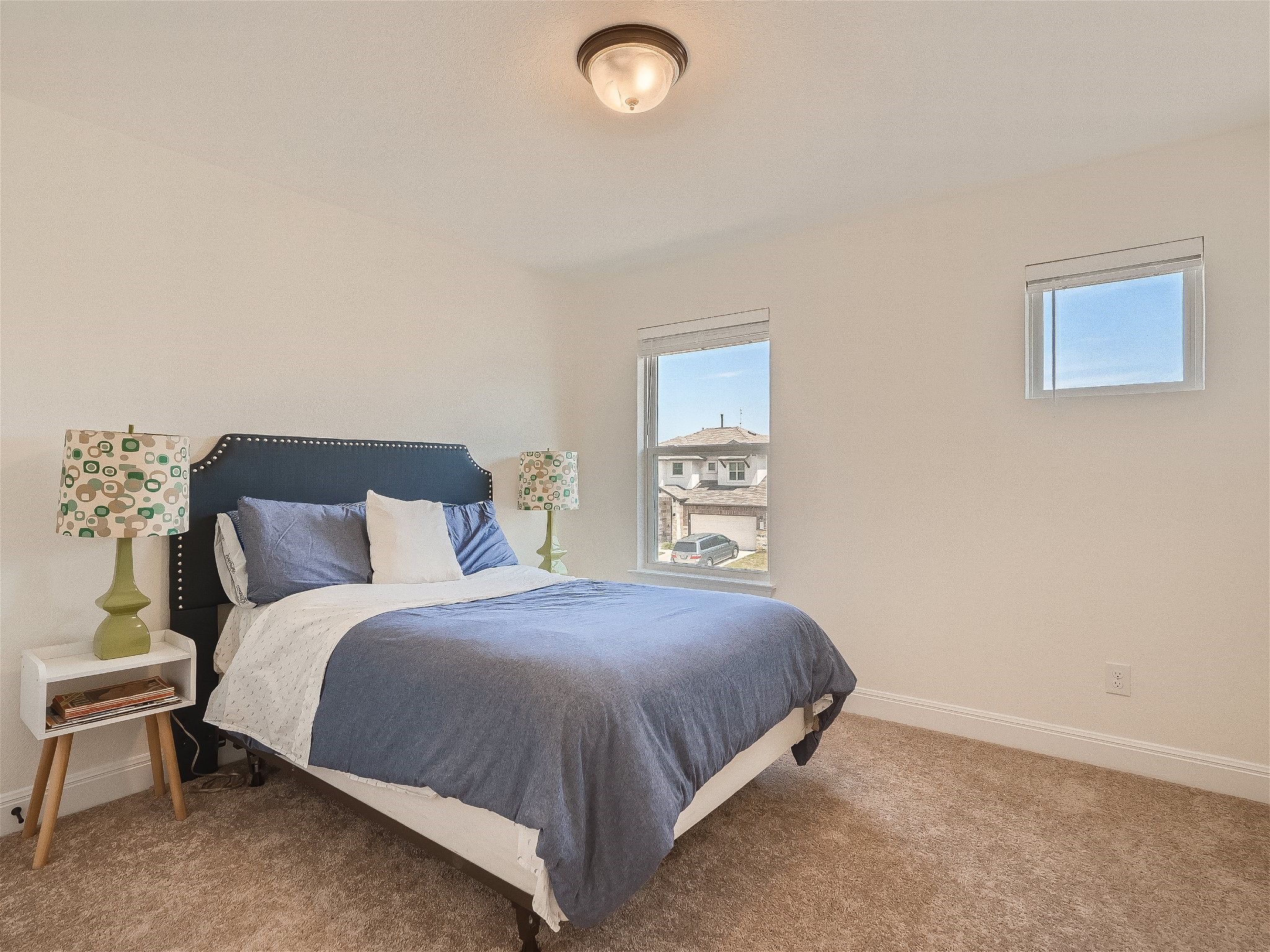 412 Arrowhead Vine Street Leander, TX 78641 - Photo 19 of 30 2nd bedroom - with lots of light and a great closet too