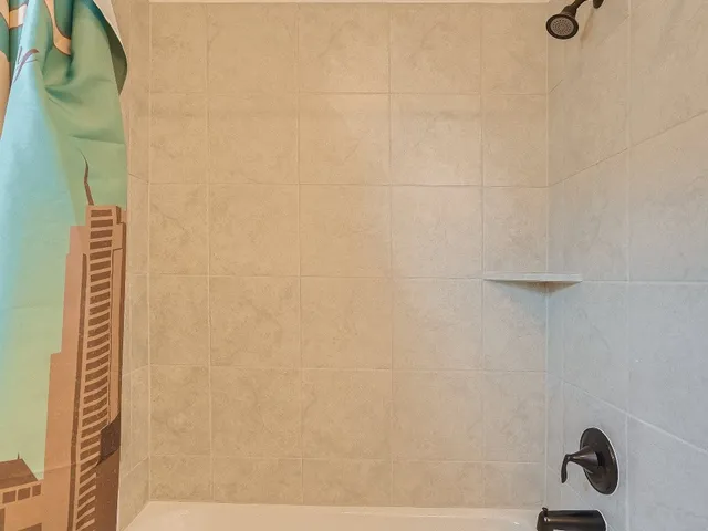 a work room with furniture and a window