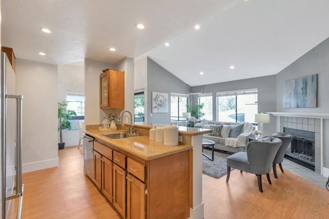 a very nice looking living room with a large window