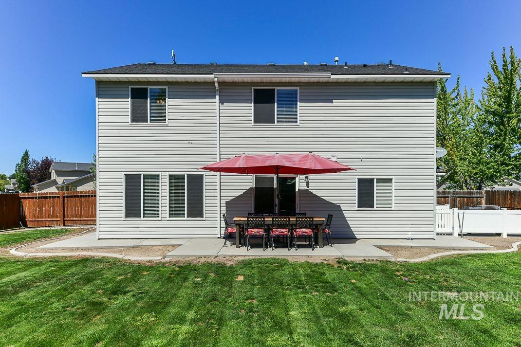 3013 Gala Trail Emmett, ID 83617 - Photo 21 of 22 Rear view of property with a patio and a fenced backyard