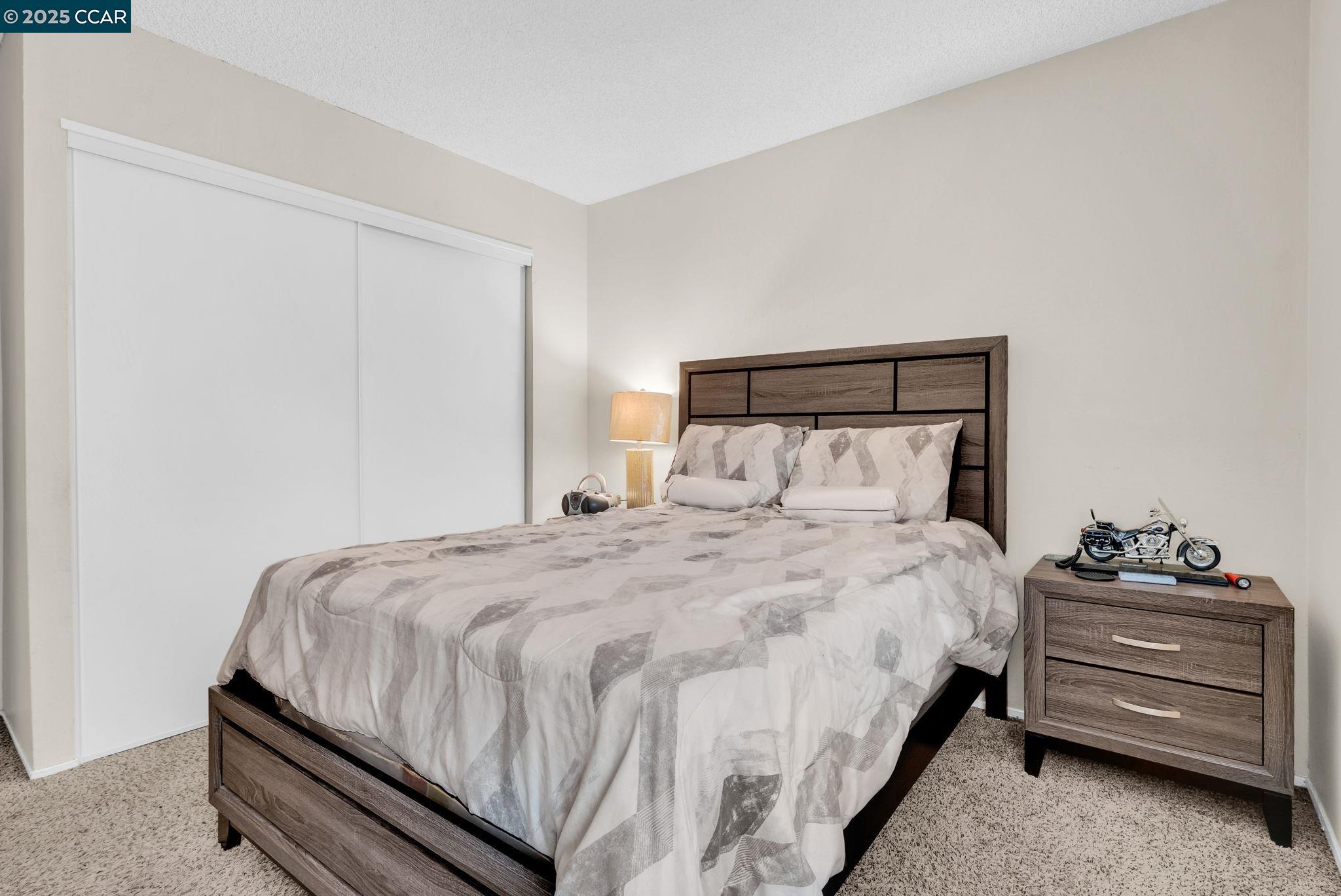 265 Tahoe Drive Rio Vista, CA 94571 - Photo 13 of 24 a bedroom with a bed and a dresser