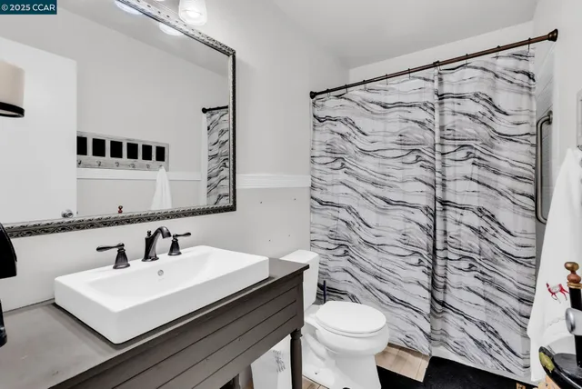 a bathroom with a sink and a toilet