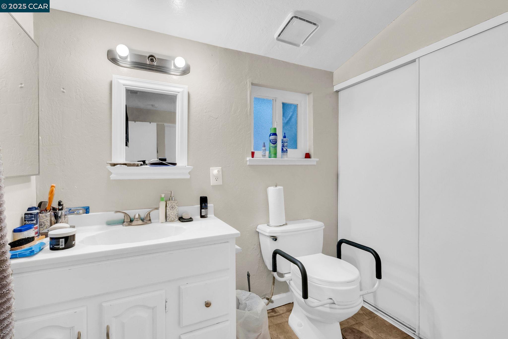 265 Tahoe Drive Rio Vista, CA 94571 - Photo 18 of 24 a bathroom with a sink mirror and vanity