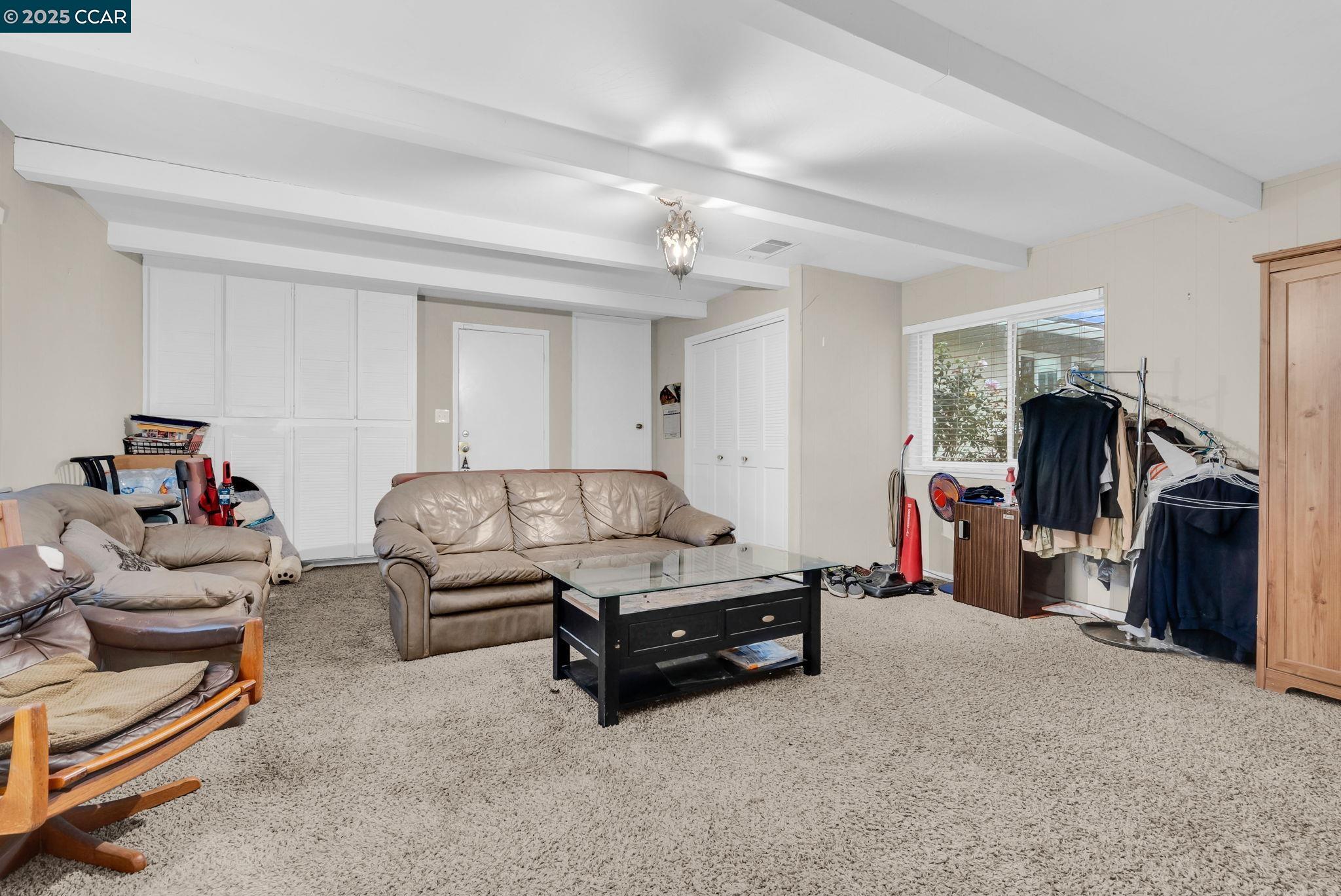 265 Tahoe Drive Rio Vista, CA 94571 - Photo 20 of 24 a living room with furniture and a gym machine
