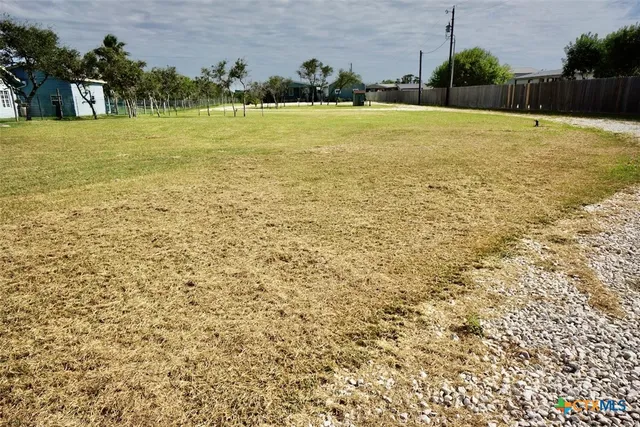 a view of a swimming pool with an ocean view