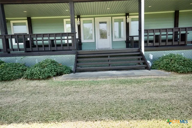 a view of a garden with potted plants