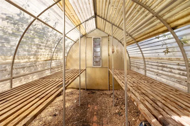a view of a house with wooden floor