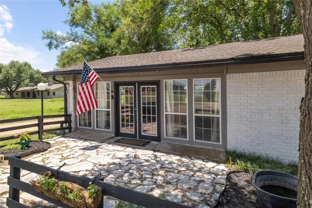 a view of a house with a garden