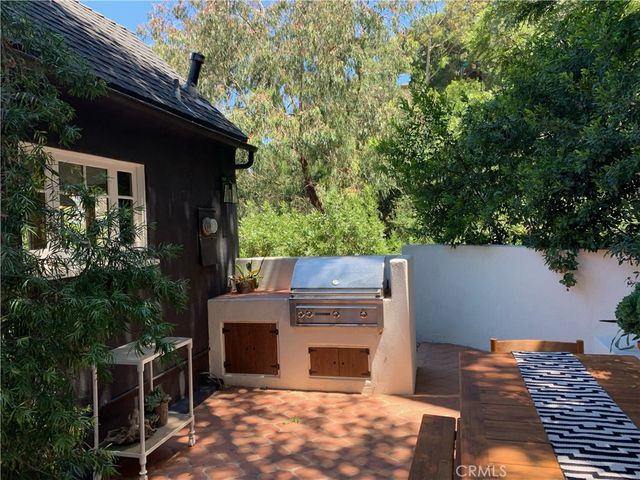 a backyard of a house with seating space