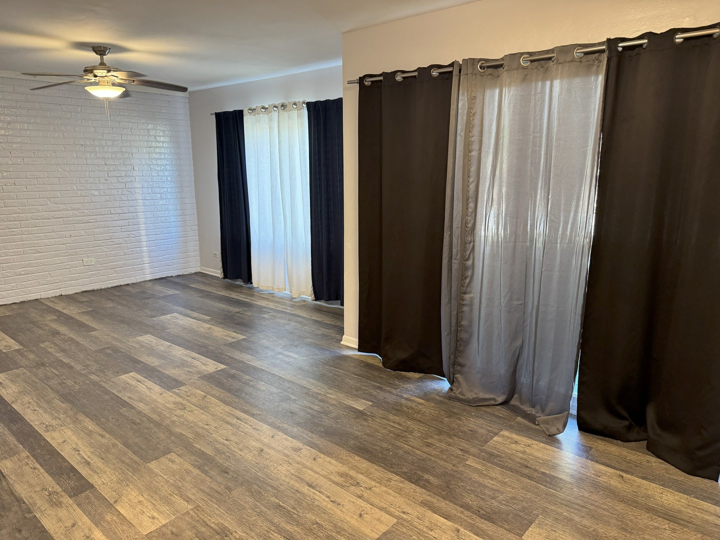 6027 103rd Street, Unit 1A Chicago Ridge, IL 60415 - Photo 5 of 22 an empty closet with wooden floor