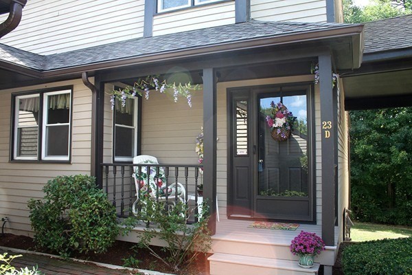 23 Highfield Road, Unit D Charlton, MA 01507 - Photo 1 of 4 a front view of a house with a porch