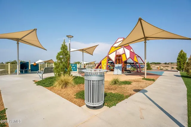 a view of swimming pool from a balcony