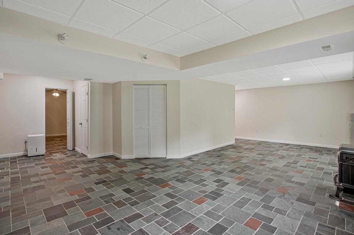 8070 Nursery Road Lusby, MD 20657 - Photo 34 of 47 Spacious, versatile basement.