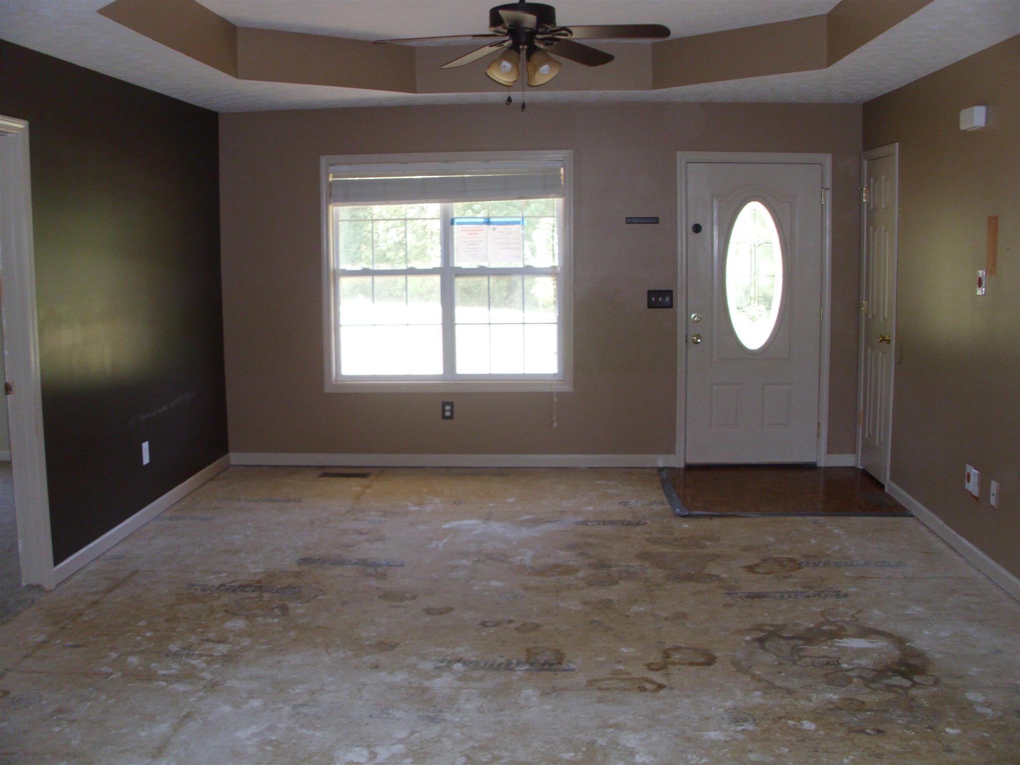 117 Point Road, Unit 117A Portland, TN 37148 - Photo 7 of 13 a view of an empty room with a window and wooden floor
