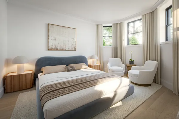 a bedroom with a bed and a couch